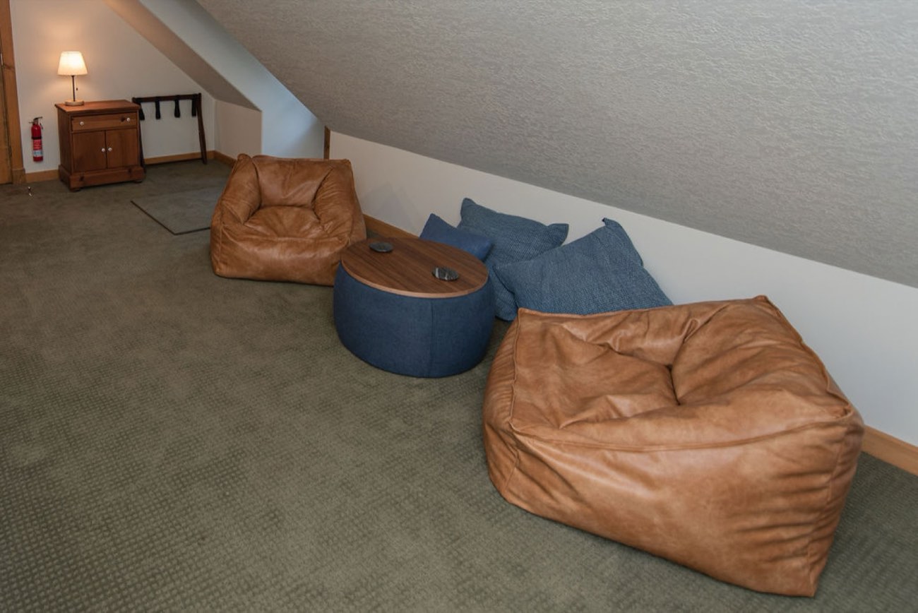 The game house loft at Camp Sunnyside with lounge seating.